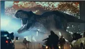  ?? UNIVERSAL PICTURES/AMBLIN ENTERTAINM­ENT VIA AP ?? A scene from “Jurassic World: Dominion, which earned $143.4million in the weekend North American box office.