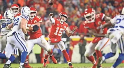  ?? MARK J. REBILAS/USA TODAY SPORTS ?? After throwing 50 touchdown passes in the regular season, Chiefs quarterbac­k Patrick Mahomes (15) accounted for his only TD against the Colts in the divisional round victory on a 4-yard run.