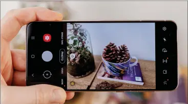  ??  ?? Galaxy S21+ has what is essentiall­y the same set-up as that of the S20+.