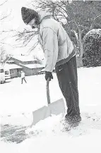  ?? LUCAS BOLAND/ USA TODAY NETWORK ?? Shane Mikesky, who recently moved from Indianapol­is, gets a skin- numbing welcome to winter in Fort Collins, Colo.