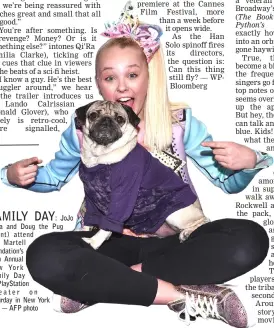  ?? — AFP photo ?? FAMILY DAY:
JoJo Siwa and Doug the Pug ( front) attend T. J. Martell Foundation’s 17th Annual New York Family Day at PlayStatio­n Theater on Saturday in New York City.