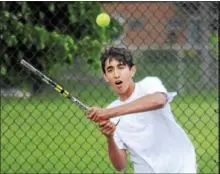  ?? GENE WALSH — DIGITAL FIRST MEDIA ?? Conestoga’s Cahlin Pragada returns a volley against Upper Dublin Monday. Pragada defeated Upper Dublin’s Andrew Duan, 6-3, 7-6, 7-5, at No. 2 singles to help the Pioneers advance to the District 1 semifinals, where they will face Unionville today.