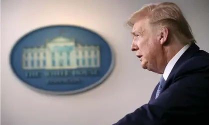  ??  ?? Donald Trump speaks about coronaviru­s in the press briefing room at the White House in Washington DC, on 16 March. Photograph: Win McNamee/Getty Images