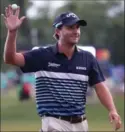  ?? CHRIS GRAYTHEN, GETTY IMAGES ?? Kevin Kisner reacts to his 95-foot eagle putt on the 18th hole Sunday.