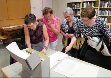 ?? SUBMITTED PHOTO ESPLANADE ?? This photo is from May 16, 2018 when members of Riverside Book Club had a tour of the archives and looked at materials held in the archives about the history of The Book Club. In the photo are Joanie Gilchrist, Judy Vizbar, Jennifer Sissons and Judy Anderson.