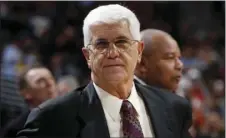  ?? AP FILE PHOTO/DAVID ZALUBOWSKI ?? In this 2008 file photo, Chicago Bulls assistant coach Del Harris looks on during the first quarter of an NBA basketball game against the Denver Nuggets in Denver.