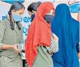  ?? ?? Muslims have been attacked for wearing the hijab headscarf in school in Karnataka