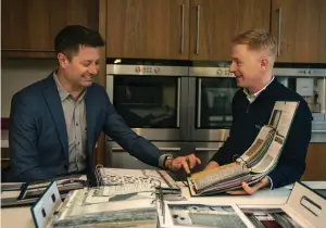  ??  ?? Architect George Clarke chooses window dressing designs with the help of local advisor, Kevin