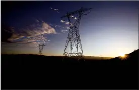  ?? TRIBUNE NEWS SERVICE ?? San Diego Gas &amp; Electric's 117-mile Sunrise Powerlink transmissi­on line runs through California's Imperial County, toward San Diego County, near the U.S.-Mexico border.