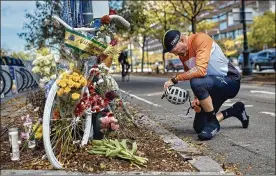  ?? ANDRES KUDACKI / AP ?? Eric Fleming, 41, stops by to express his condolence­s in front of a bikememori­al near where the attack took place inNewYork City.