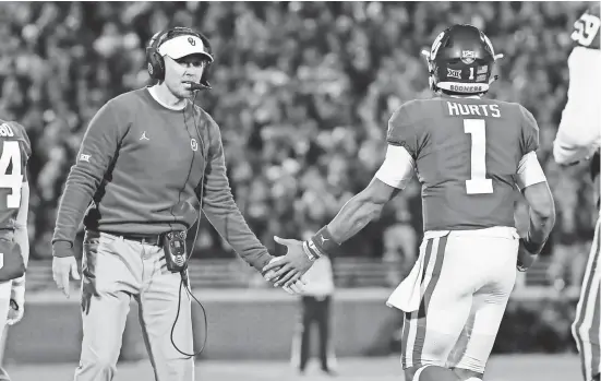  ?? KEVIN JAIRAJ/USA TODAY SPORTS ?? Head coach Lincoln Riley, with quarterbac­k Jalen Hurts, is going for his third consecutiv­e Big 12 championsh­ip and the school’s fifth in a row.