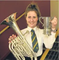  ?? Pictures: Dougie Nicolson. ?? Top: small primary schools choir winners Strathmart­ine Primary. Above: left – the brass ensemble class winners from Carnoustie High/arbroath High; right – brass solo 15 and under winner Holly Bennett from Arbroath High.