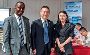  ?? ?? Chinese Ambassador to Rwanda Wang Xuekun (centre) attends a job fair held by Chinese companies in Kigali, Rwanda, on 9 September