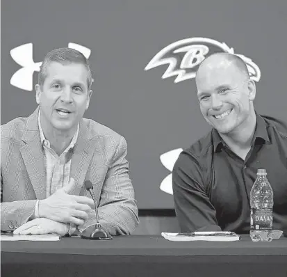  ?? KARL MERTON FERRON/BALTIMORE SUN ?? Ravens coach John Harbaugh, left, and general manager Eric DeCosta have a lot of work to do as they prepare for the 2021 NFL draft, which begins with the first round on Thursday.