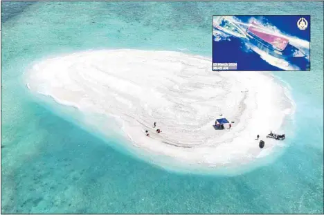  ?? ?? In this photo provided by the Philippine Coast Guard, Filipino scientists reach sandbars called Sandy Cay at the disputed South China Sea on March 21. Chinese coast guard ships, backed by a military helicopter, tried to dangerousl­y block but failed to stop two Philippine government vessels carrying scientists from reaching two barren sandbars called Sandy Cay in the disputed South China Sea, Philippine officials said Friday. Inset: In this screen grab from video provided by the Armed Forces of the Philippine­s, a Chinese coast guard ship uses water cannons and closely maneuvers beside a Philippine resupply vessel Unaizah May 4 as it approaches Second Thomas Shoal, locally called Ayungin shoal, at the disputed South China Sea on March 23. (AP)