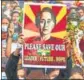  ?? AFP/FILE ?? A poster of Aung San Suu Kyi at a rally in Monywa.
