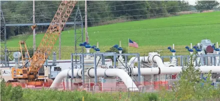  ?? MARK HOFFMAN / MILWAUKEE JOURNAL SENTINEL ?? An Enbridge pipeline pumping station is shown under constructi­on in September in the Town of Medina in eastern Dane County. The Dane County pumping station is the last of 13 to be constructe­d for Line 61 upgrade project allowing it to pump more oil.