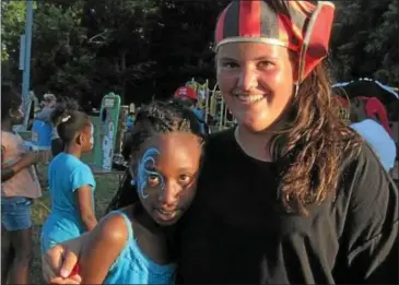  ??  ?? Wall Camp counselor Lindsey Carr and camper Liala Bennett at the Playground Carnival July 24.