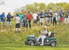  ?? ASSOCIATED PRESS FILE PHOTO ?? Organizers of the British Open have refused a request by former champion John Daly to use a golf cart at the championsh­ip in Royal Portrush this month. Daly had applied to use a cart because of his arthritic right knee. The R&A said it was declining the request because ‘walking the course is an integral part of the championsh­ip and is central to the tradition of links golf.’ It said it was important to ‘ensure that, as far as possible, the challenge is the same for all players in the field.’