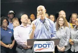  ?? WILFREDO LEE/AP ?? Gov. Rick Scott speaks about the Sawgrass Expressway project during a news conference at the Florida Department of Transporta­tion District Four Office in Fort Lauderdale.