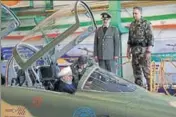  ?? AFP ?? President Hassan Rouhani at the cockpit of Kowsar fighter jet.