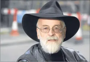  ?? Picture: PA. ?? Sir Terry Pratchett died last month aged 66. His final novel The Shepherd’s Crown is the fifth book featuring the young witch Tiffany Aching.