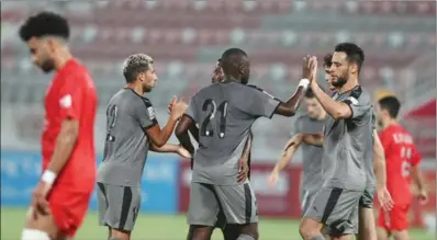  ??  ?? Al Wakrah players celebrate one of their three goals against Al Duhail during their Ooredoo Cup Round 3 Group A match played at the Al Duhail Stadium on Tuesday.