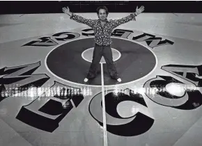  ?? MILWAUKEE JOURNAL SENTINEL ?? Artist Robert Indiana with MECCA floor he designed.