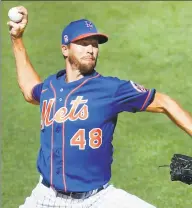  ?? Kathy Willens / Associated Press ?? Mets pitcher Jacob deGrom is listed as ‘day-to-day’ after experienci­ng back tightness on Tuesday night.