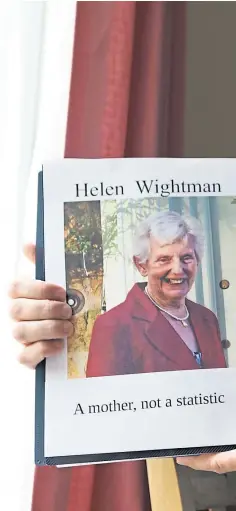  ?? ?? HEARTBREAK AND ANGER: Left, Helen Wightman, who died of Covid-19 in a care home and, above, Alan with a picture of his mother that bears the message “A mother, not a statistic”.