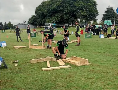  ?? JO LINES-MACKENZIE/FAIRFAX NZ ?? Contestant­s built a bar leaner as one of their tasks in the Waikato/bay of Plenty Young Farmers regional final