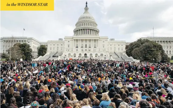  ?? ANDREW HARNIK / THE ASSOCIATED PRESS ?? Students rally outside the Capitol in Washington, D.C., on Wednesday, as part of a nationwide walkout to protest gun violence in response to the massacre of 17 in a Florida school.