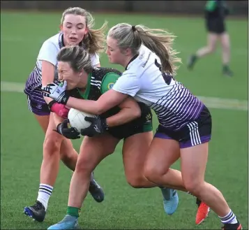  ?? ?? Mercy Mounthawk’s Kate Collins is caught on the face by Allie Tobin, Skibbereen CS, during the Munster PPS Senior ‘A’ Football final at Banteer in north Cork.