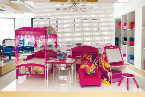  ?? (Melissa Fares/Reuters) ?? CHILDREN’S BEDS and toys are on display at one of Toys ‘R’ Us’ biggest vendors of children’s furniture, Delta Children Corp., at its main showroom in New York last week. ‘I have a short-term concern about the loss of business, the loss of one of my...