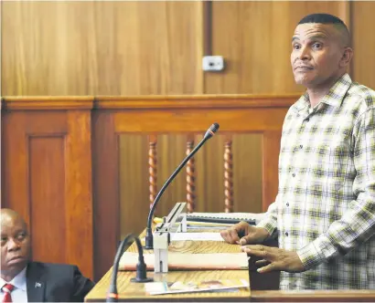  ?? Picture: Neil McCartney ?? GLARING. Joburg mayor Herman Mashaba yesterday watches Jonathan Constable testify at Johannesbu­rg Magistrate’s Court in a bid to get bail.