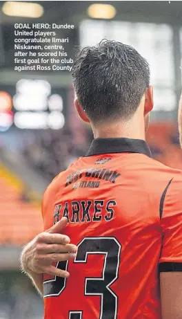  ?? ?? GOAL HERO: Dundee United players congratula­te Ilmari Niskanen, centre, after he scored his first goal for the club against Ross County.