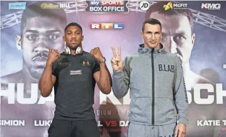  ?? DANIEL LEAL-OLIVAS, AFP/GETTY IMAGES ?? Wladimir Klitschko, right, would like nothing better than to deal Anthony Joshua his first loss and reclaim the heavyweigh­t title.