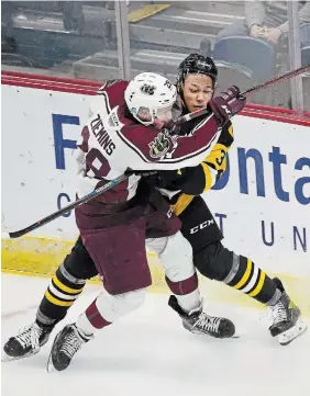  ?? BARRY GRAY THE HAMILTON SPECTATOR ?? Hamilton’s Noah Van Vliet, here colliding with Peterborou­gh’s Kasparas Ziemins in Game One of the playoffs, is the first of the Bulldogs quintet of Noahs.