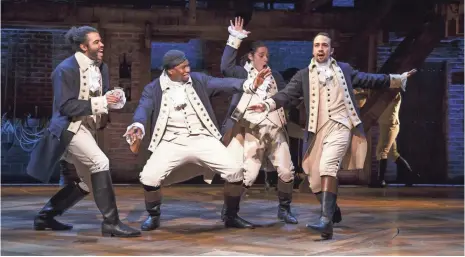  ?? JOAN MARCUS ?? Lin-Manuel Miranda, right, and multicultu­ral sensation Hamilton were nominated for 16 Tony Awards, the most ever.