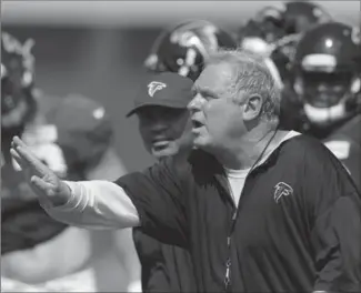  ?? ASSOCIATED PRESS FILE PHOTO ?? The National Football League’s Atlanta Falcons have dismissed defensive co-ordinator Richard Smith, pictured, and defensive line coach Bryan Cox.