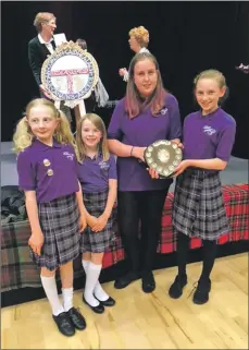  ??  ?? Flora Sutherland, Amy MacLachlan, Mairi-Ann MacGillivr­ay and Isabella Sutherland of Oigridh Shuaineart – winners of The Campbell Memorial Shield.