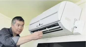  ?? PHOTO: GERARD O’BRIEN ?? Saving power . . . University of Otago academic Michael Jack is one of a team of academics who says the country’s electricit­y demand could be reduced if people used household appliances in offpeak hours.