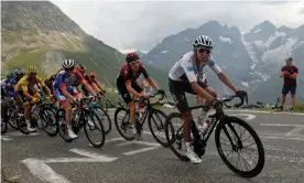  ?? Photograph: Gonzalo Fuentes/Reuters ?? Egan Bernal (right) of Team Ineos leads his teammate Geraint Thomas and the rest of the peloton in the mountains during stage 18 of the Tour de France.