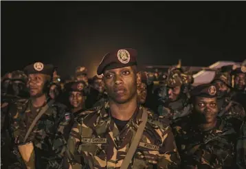  ?? ALEXIS HUGUET/GETTY-AFP ?? Soldiers withdraw: Kenyan soldiers from the East African Community regional force prepare to leave the Democratic Republic of Congo on Sunday at Goma’s airport. The EAC began its withdrawal after Kinshasa did not renew its mandate. The EAC deployed troops in the region in 2022 after the resurgence of the M23 rebel group.