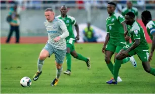  ?? AFP file ?? Everton’s Rooney dribbles during a SportsPesa Super Cup final match against Gor Mahia. —