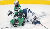  ?? JASON FRANSON THE CANADIAN PRESS FILE PHOTO ?? Dallas Stars’ Tyler Seguin, left, and Tampa Bay Lightning’s Tyler Johnson get tangled up in NHL Stanley Cup final action in Edmonton on Sept. 25, 2020. There is a chance six-time all-star forward Seguin could play for the first time since off-season hip surgery next Monday or Tuesday.