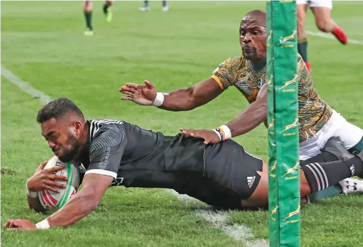  ?? Photo: Ian Muir ?? Vilimoni Koroi scoring in to overtime to prevent Dubai champions New Zealand from missing out on the Cup Quarter Final in Cape Town on December 9, 2018.