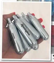  ??  ?? Nitrous oxide canisters, left, were found on the ground outside Sparkles Boutique