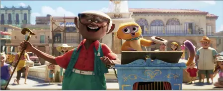  ?? SONY PICTURES ANIMATION PHOTOS ?? Juan de Marcos voices Andres, and Lin-Manuel Miranda is his pet kinkajou and musical partner, Vivo, in “Vivo.”