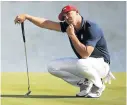  ?? Picture: REUTERS/CARL RECINE ?? HARD TO FATHOM: Brooks Koepka is distraught after a wayward tee shot cost a spectator one of her eyes.